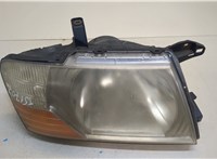 MN133748, MN117106 Фара (передняя) Mitsubishi Pajero / Montero 2000-2006 20368511 #1